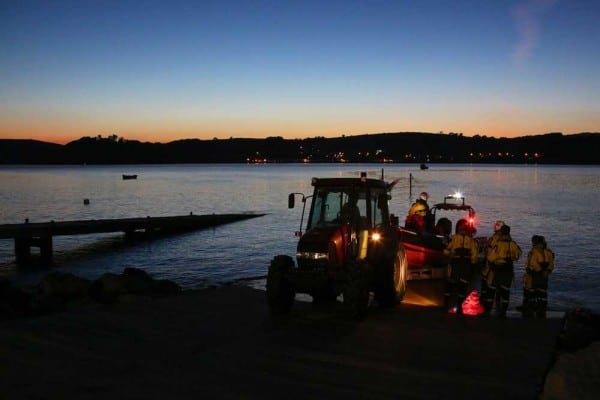 Ferryside Lifeboat being recovered by tractor at dusk